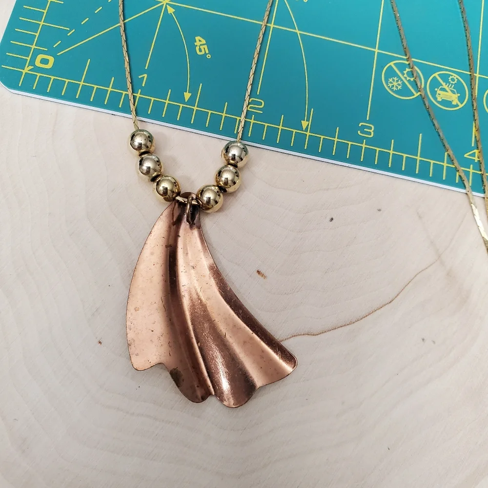 Gold Bead Illusion Horn Necklace